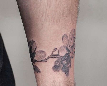 泼墨小腿桃花纹身图案