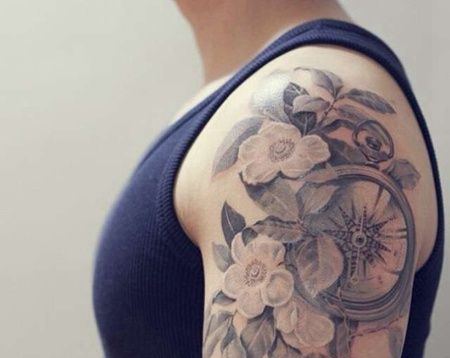 写实大臂花卉钟表纹身图案