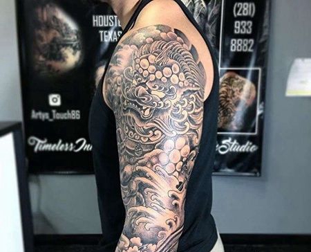 新传统胳膊唐狮牡丹纹身图案