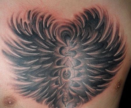 小腿上抽象眼睛纹身图案