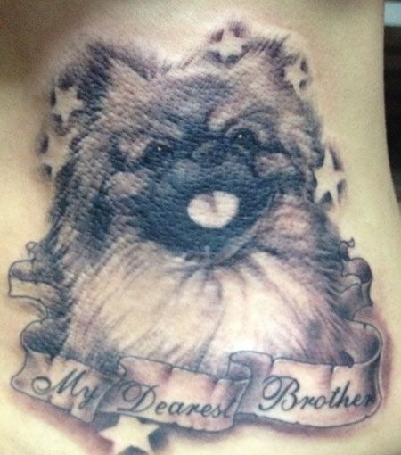 可爱黑白小狗纹身图案