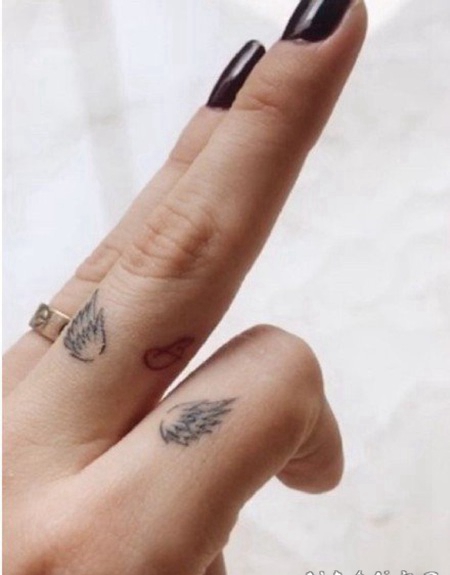 精美又个性的手指小戒指纹身作品