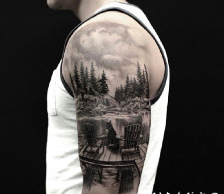 手臂风景纹身 写实风格的男性大臂风景纹身图案