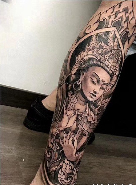 包大臂的佛主题纹身作品图片