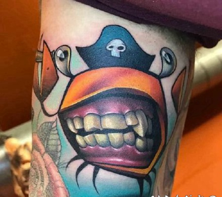 大牙怪卡通纹身-涂鸦艺术家Josh Peacock创作的纹身作品