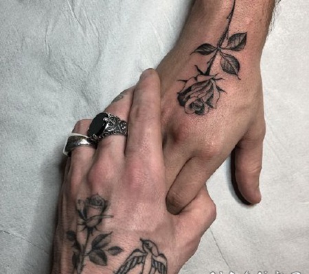 小手臂上的黑灰色点刺小纹身图片