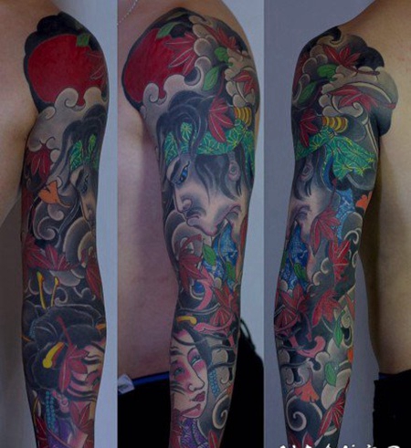 老传统风格的花臂纹身作品