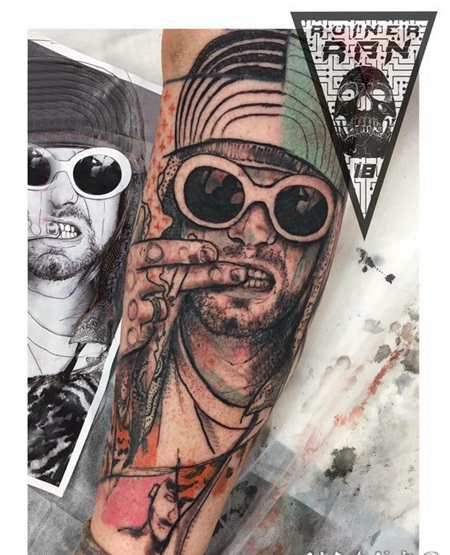 人物肖像纹身 男生手臂上彩绘的人物肖像纹身图片