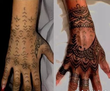 蕾哈娜手上纹身 蕾哈娜手上黑色的部落图腾纹身图片