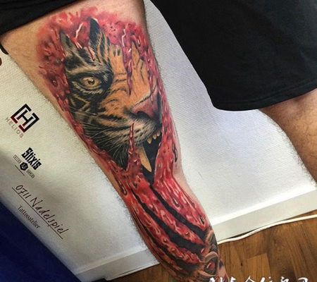撕裂的猛兽，腿部猛虎撕皮d纹身图案