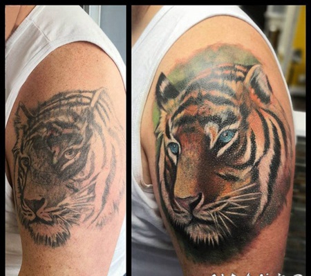 老虎头纹身图案 男生大腿上素描的老虎头纹身图片