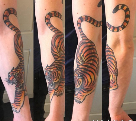 纹身老虎 男生手臂上彩绘的老虎纹身图片