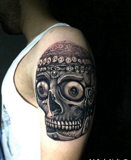 骷髅纹身图片 男生大臂上创意的骷髅纹身图片