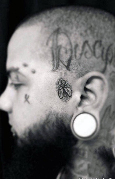 黑色线条素描点刺技巧经典脸部纹身图案