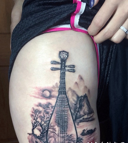 美女大腿古筝山水画纹身图案