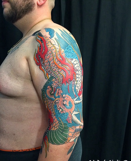 手臂大气的火麒麟纹身图案