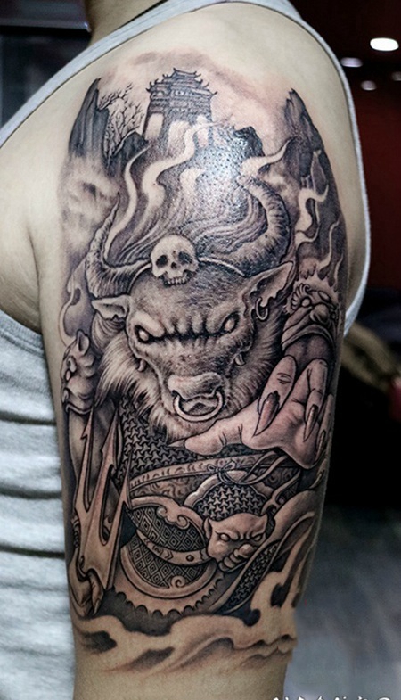 手臂牛魔王霸气纹身图片