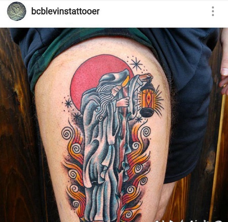 大腿上的卡通风格形象神秘的德鲁伊纹身图片