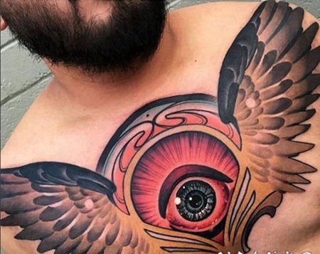 男性满胸霸气的鹰和大眼睛纹身图片