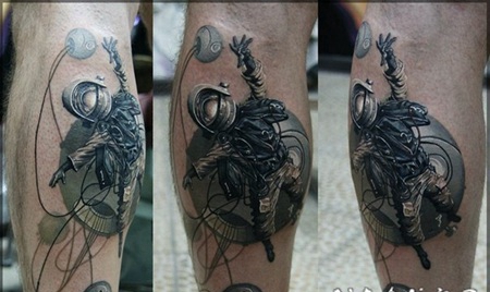 小腿彩色与拉拢行星太空人纹身图案