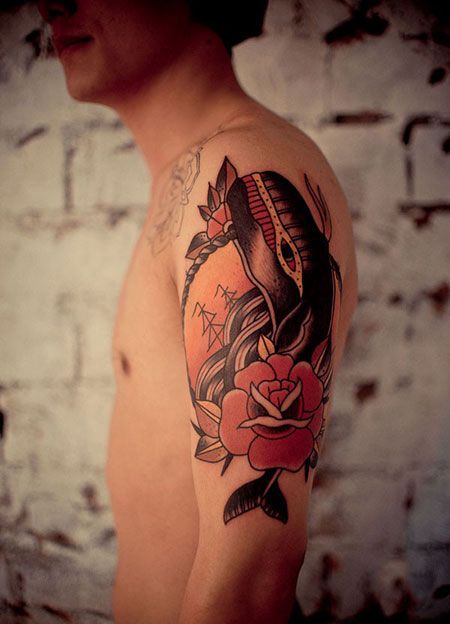 手臂玫瑰与鲸鱼纹身图案