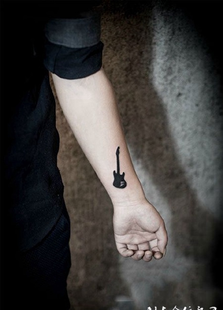 音乐梦，手臂吉他纹身图案