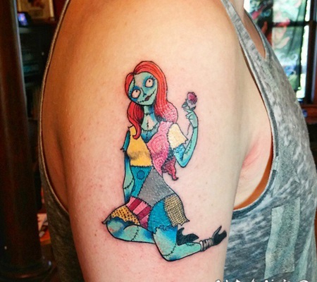 小小的五彩浪漫怪物娃娃手臂纹身图案