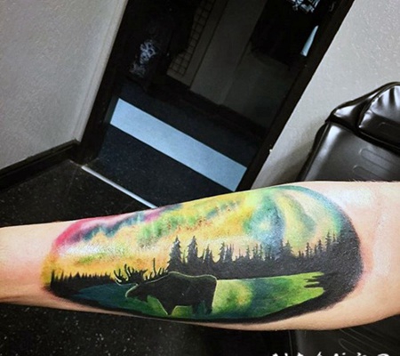 五彩野生麋鹿和风景手臂纹身图案