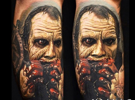 手臂惊人的彩色恐怖风格僵尸与血腥的手纹身图案