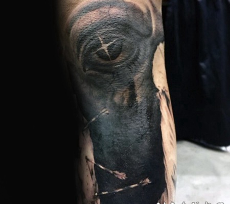 神秘的黑色恶魔之眼手臂纹身图案