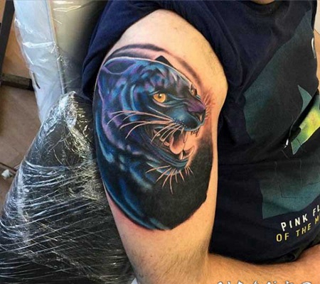 new school精美的彩绘黑豹手臂纹身图案