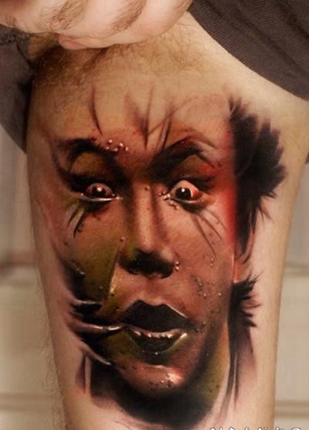 彩色恐怖风格的男性肖像手臂纹身图案