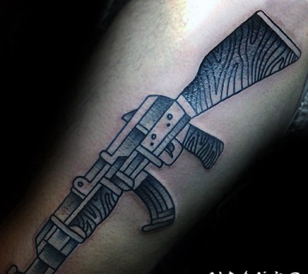 手臂个性黑灰AK步枪纹身图案