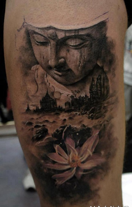 黑色的古城和如来佛祖雕像莲花手臂纹身图案