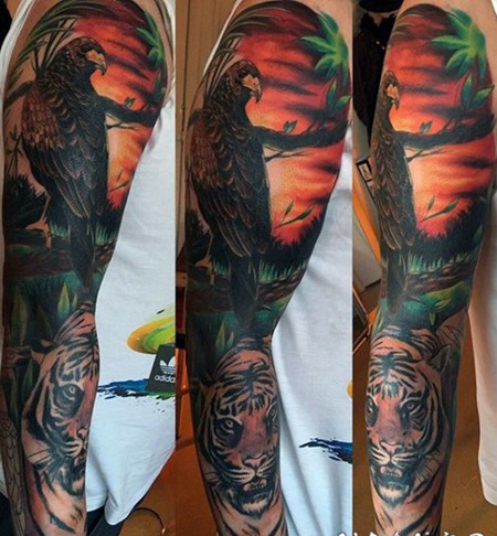 手臂丰富多彩的野外环境老虎和鹰纹身图案