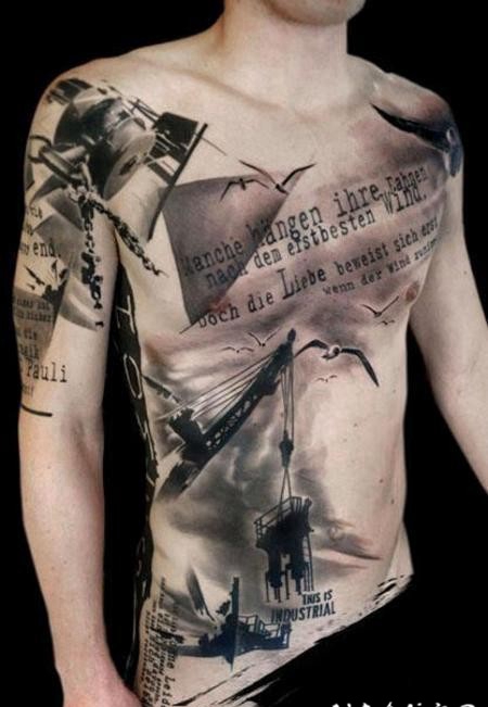 腹部逼真的工业主题建筑和字母纹身图案