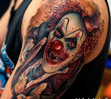 手臂彩色的邪恶小丑纹身图案
