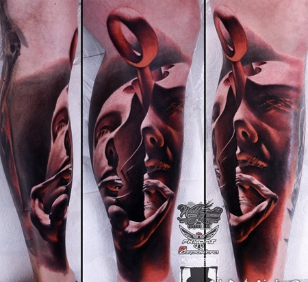 小腿神秘的彩色男子肖像纹身图案