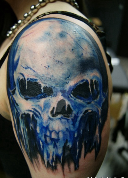 大臂丰富多彩的恶魔骷髅纹身图案