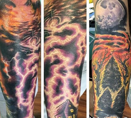 手臂五彩绚丽神秘的外星飞船与闪电房子纹身图案