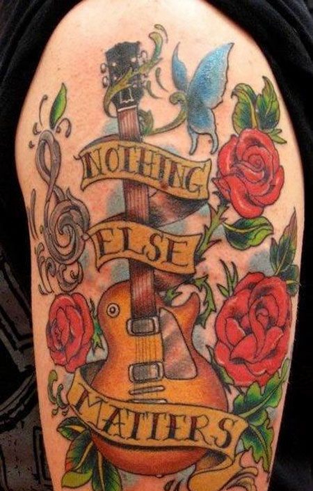 手臂吉他音符玫瑰纹身图案