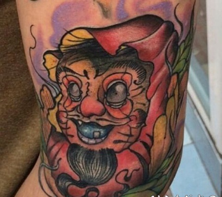 old school有趣的邪恶达摩叶子手臂纹身图案