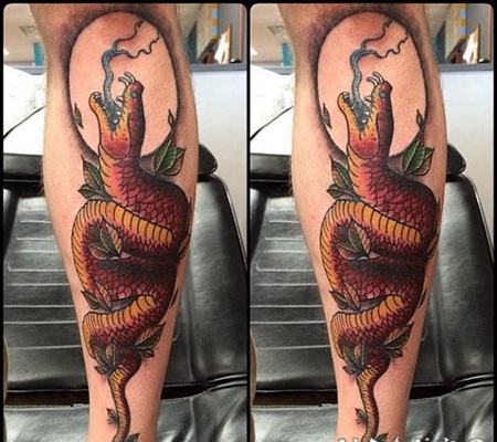 彩色的邪恶蛇与树叶手臂纹身图案