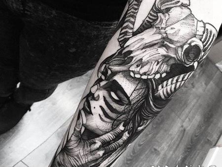 点刺风格黑色部落女性和羊头骨手臂纹身图案