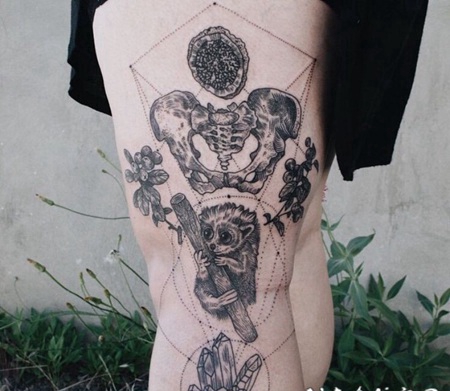 腿部雕刻风格黑色骨骼动物和几何纹身图案