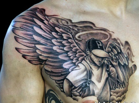 胸部设计有趣的黑白天使男孩纹身图案