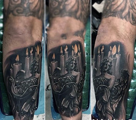 手臂有趣的彩色天使和燃烧的蜡烛纹身图案