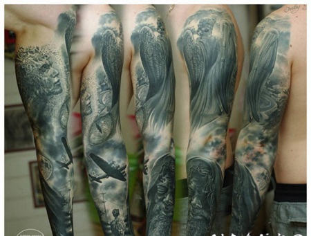 手臂灰色的天使雕像和二战轰炸机纹身图案