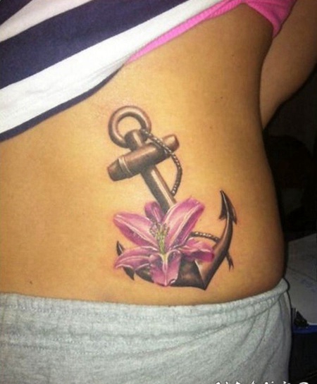 女孩子腰部传统美丽的百合花和船锚纹身图案