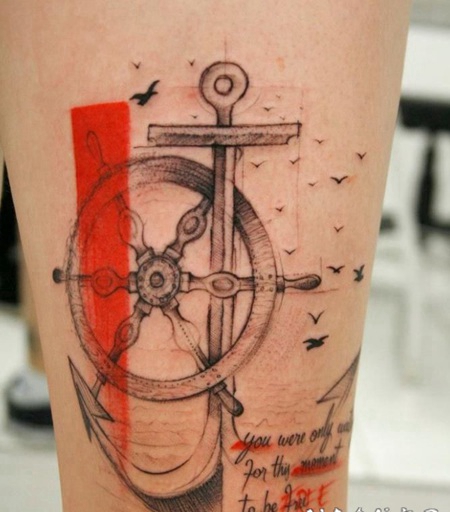 腿部船舵与船锚和字母纹身图案